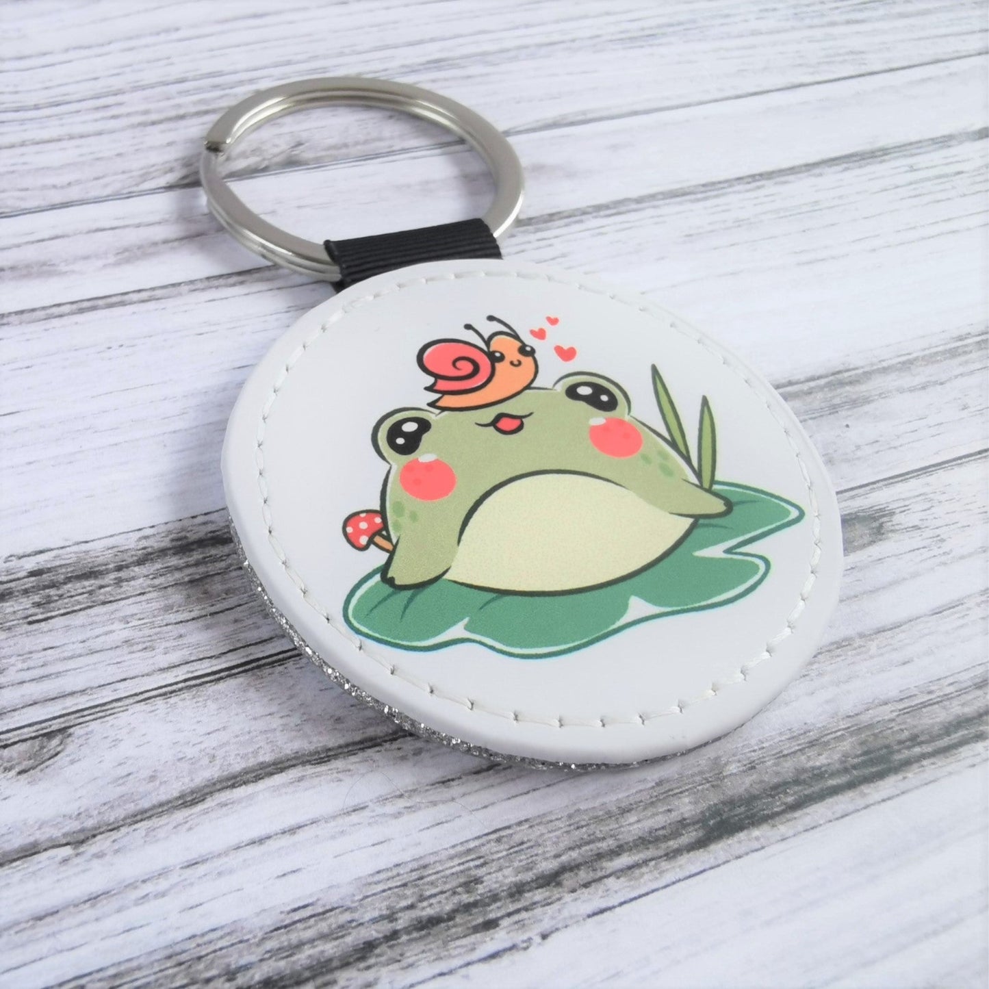 Kawaii frog with snail printed PU keyring with silver glitter rear