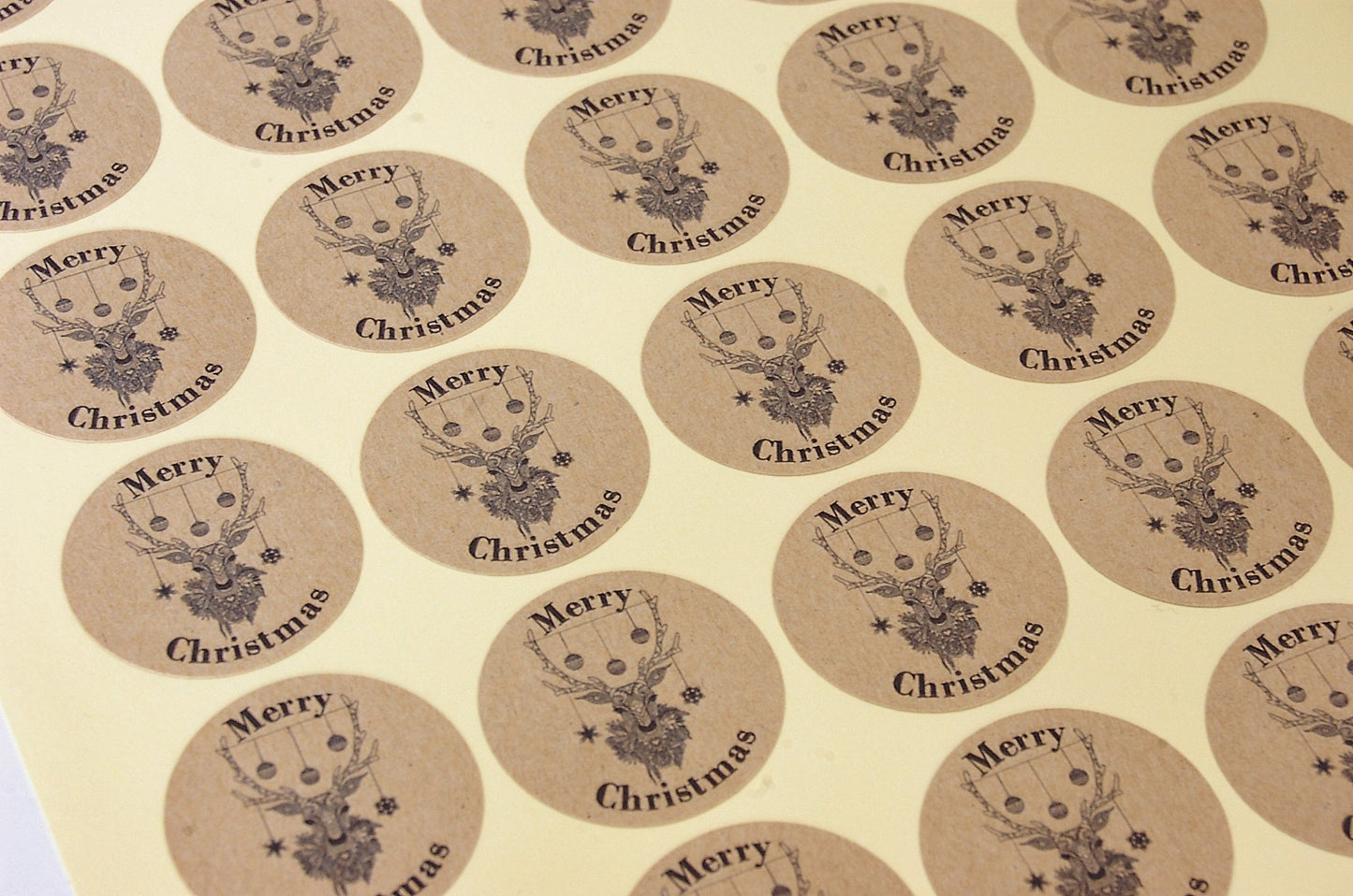 35mm Kraft Christmas Stickers featuring reindeer head